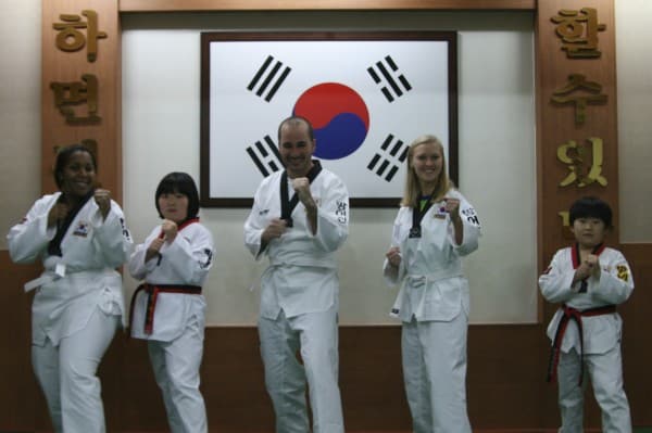 Alexis, Griffin and Valerie with the small korean black belts that could at any moment turn on us and kill us with just their pinky finger!